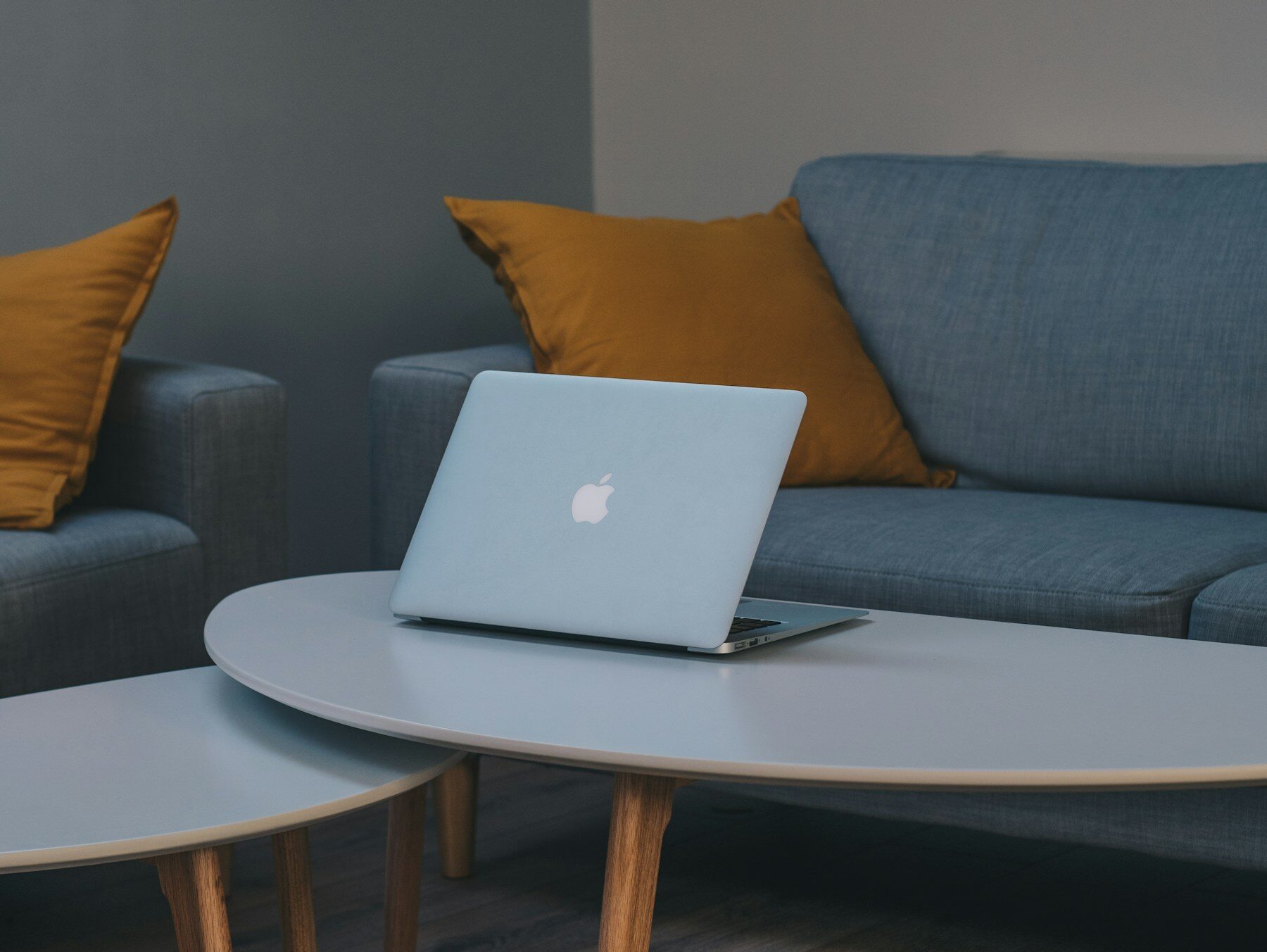 A laptop set up on a clean, modern workspace